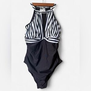 Black and white pinstripe one piece halter neck swimsuit with mesh cutout padded